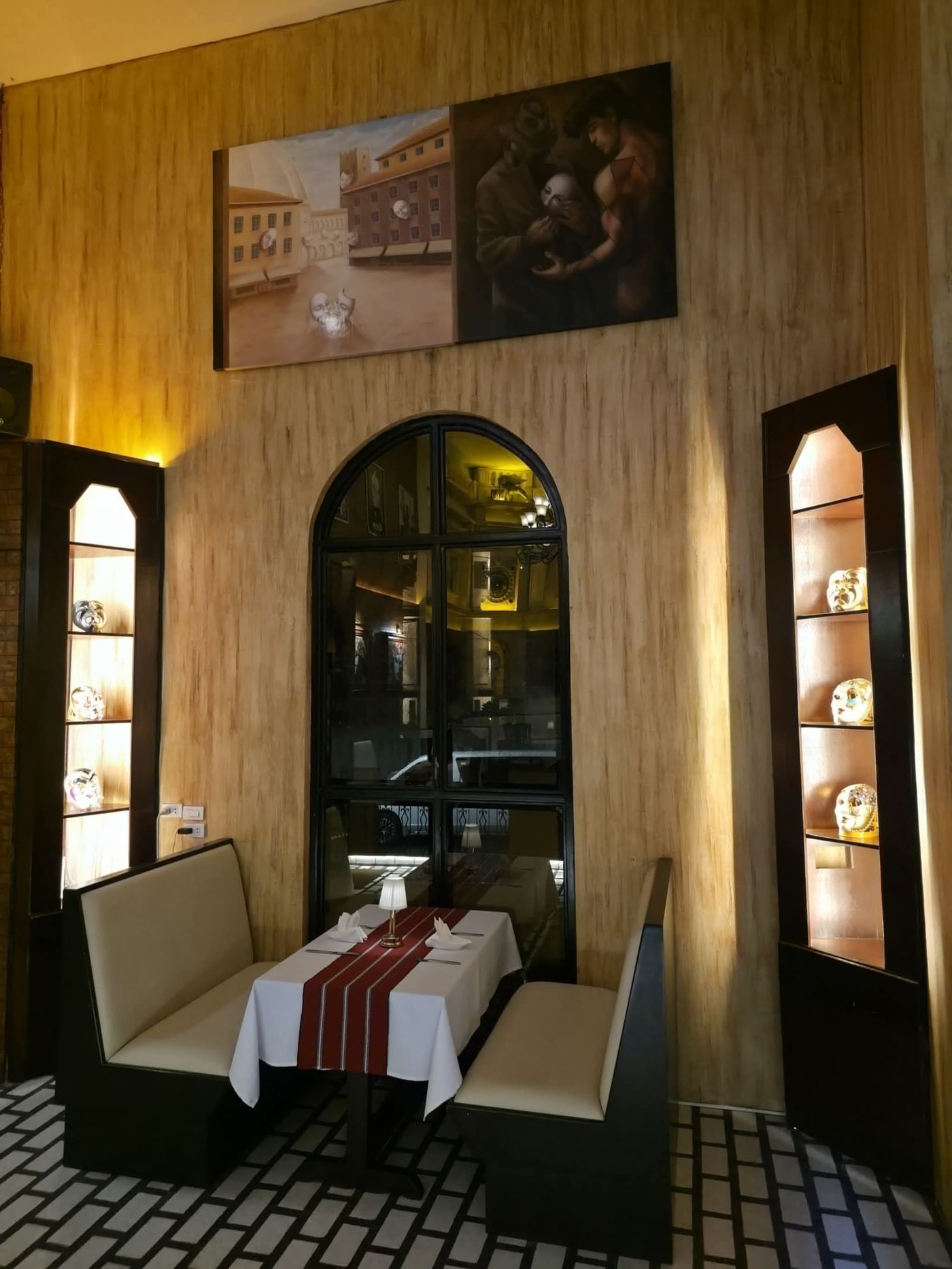 Intimate booth seating with mask display cases
