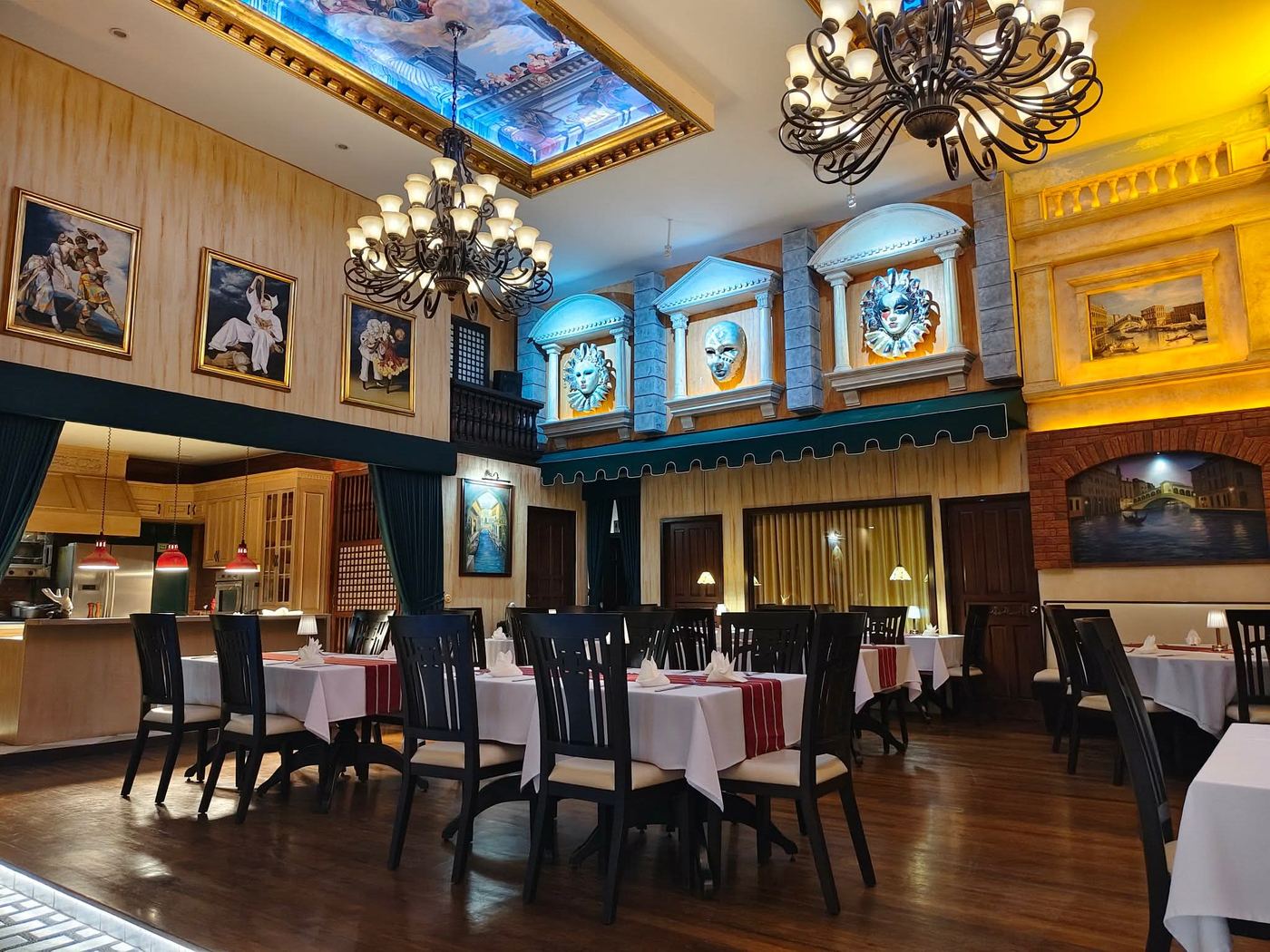 Piccolo Padre B29 dining room under the chandeliers