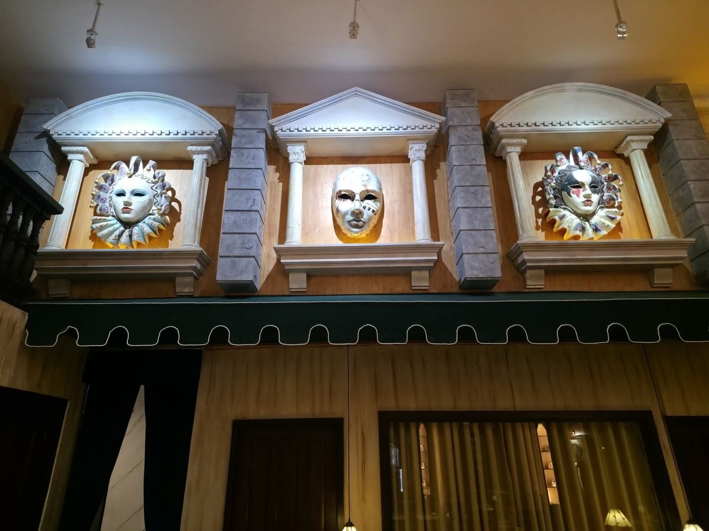 Venetian masks displayed in the restaurant